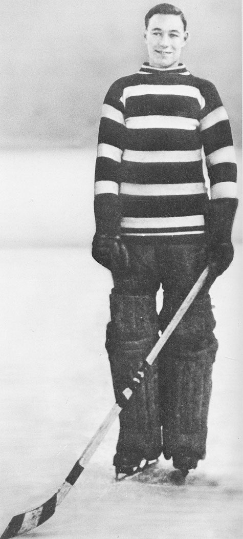 Clinton Benedict standing in goalie equipment