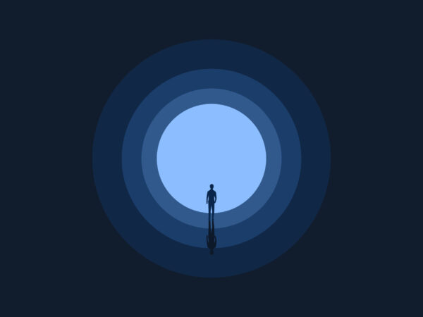 Businessman leaves the dark tunnel to find the light